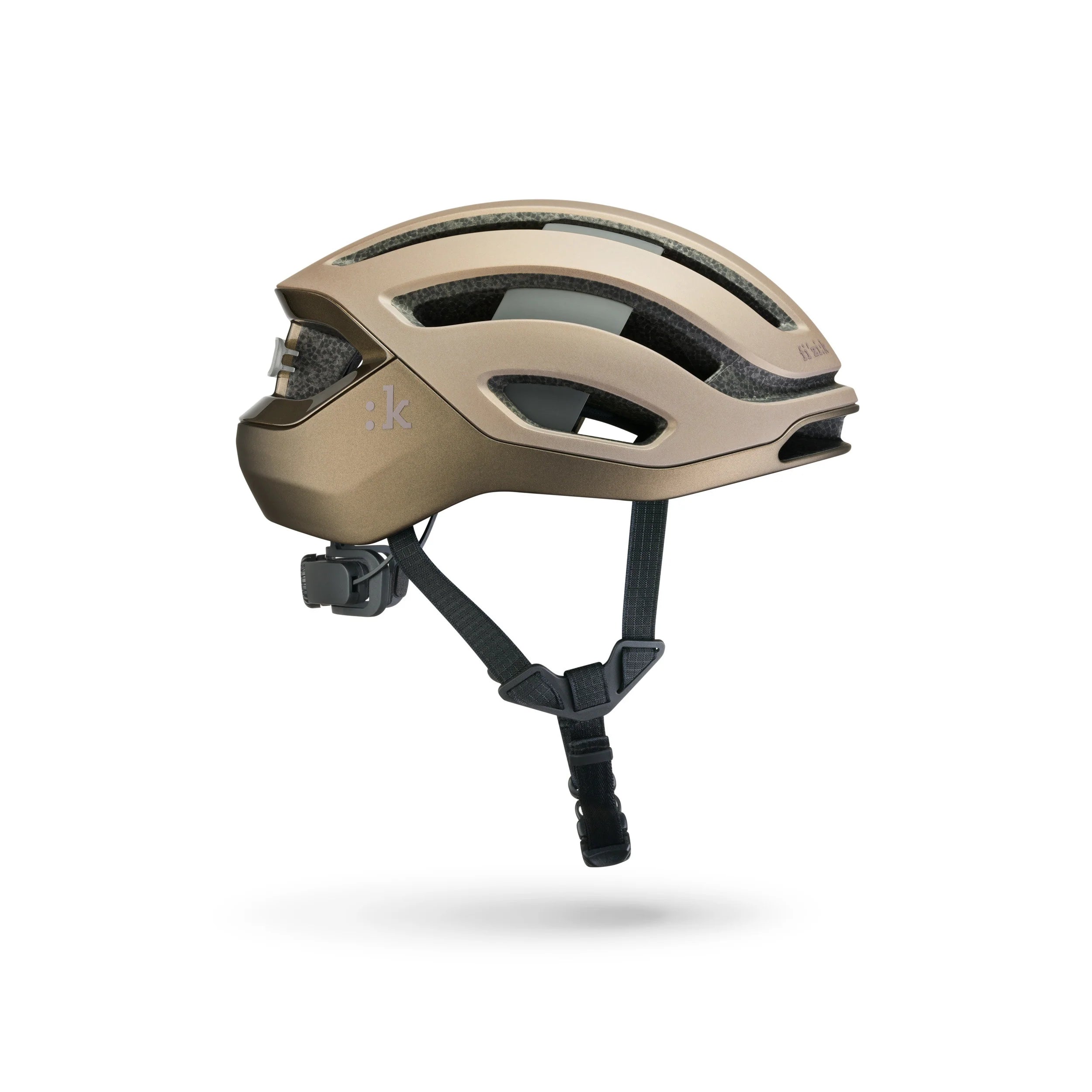 Bronze helmet with black straps on a white background